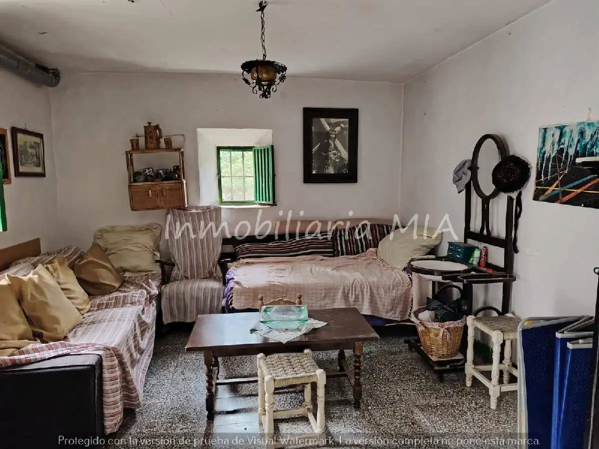 Sala d'estar de Casa o xalet en venda en Málaga