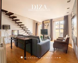 Living room of Duplex for sale in  Madrid Capital  with Air Conditioner and Balcony