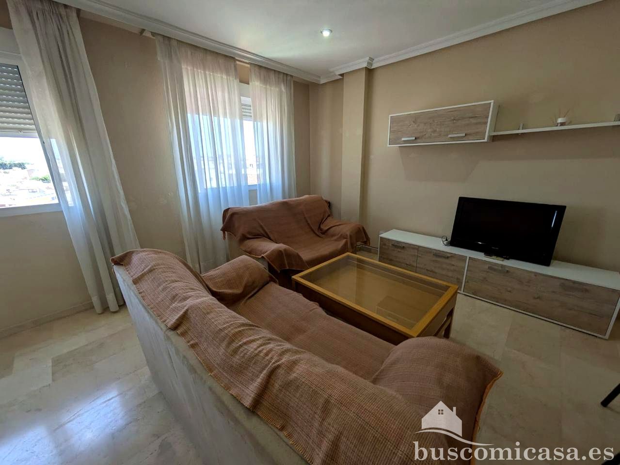 Sala d'estar de Pis de lloguer en Linares amb Aire condicionat i Moblat