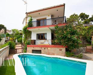 Exterior view of House or chalet for sale in Castelldefels  with Air Conditioner, Heating and Private garden