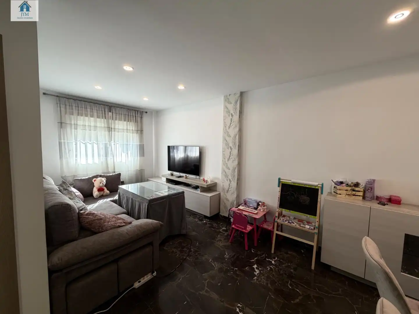 Sala de estar de Casa adosada en venta en La Zubia con Jardín privado y Balcón