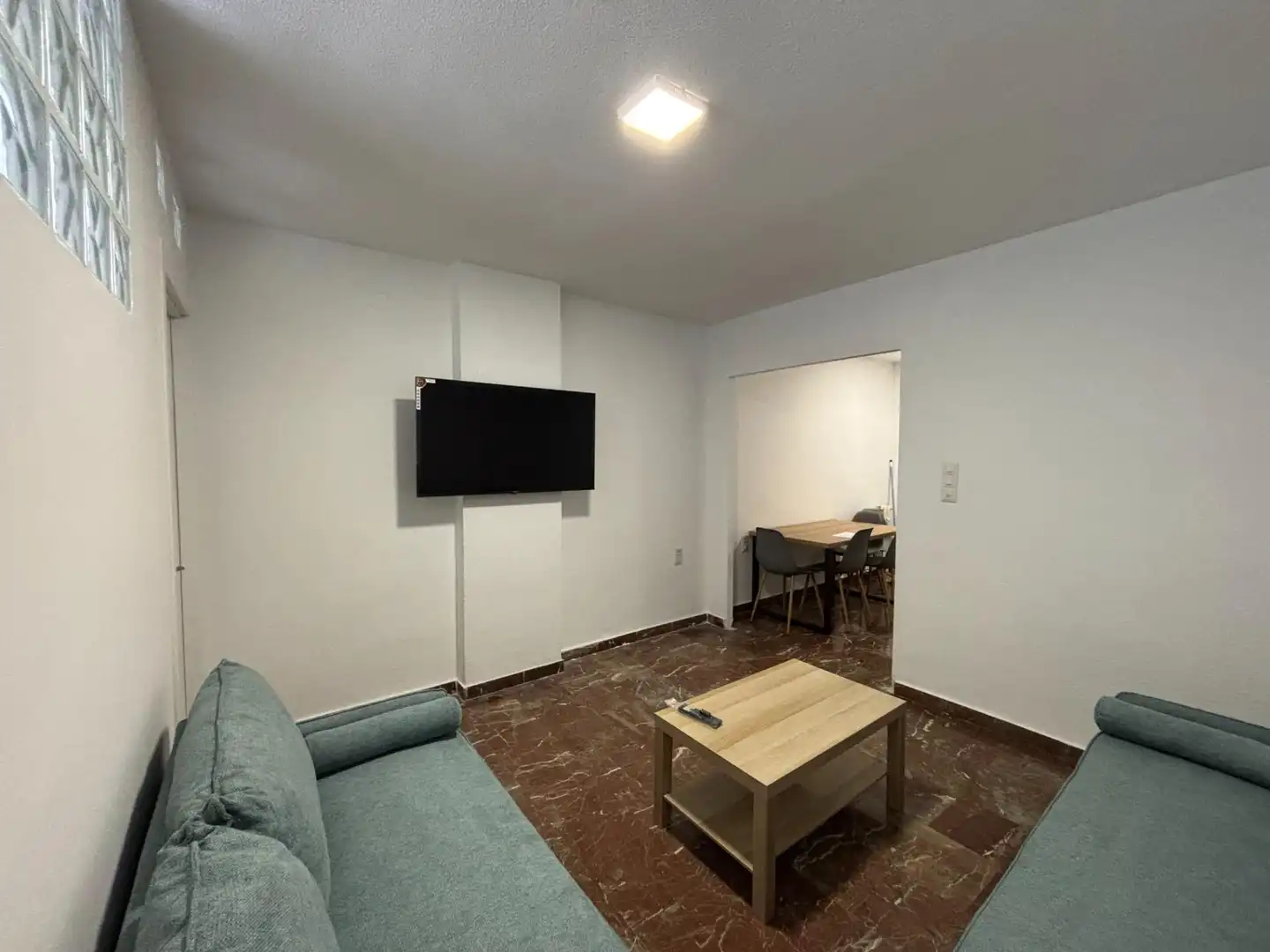 Sala de estar de Piso para compartir en Granada con Calefacción y Amueblado