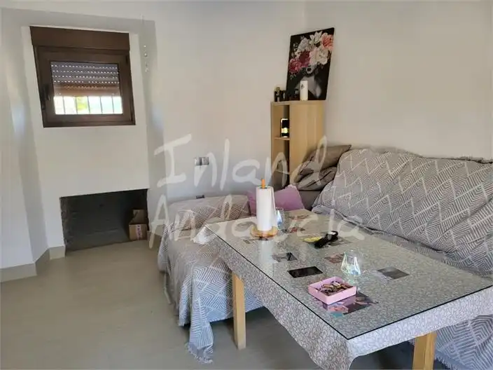 Sala de estar de Casa adosada en venta en Antequera