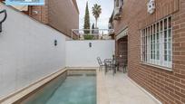 Swimming pool of Single-family semi-detached for sale in  Granada Capital  with Heating, Private garden and Terrace