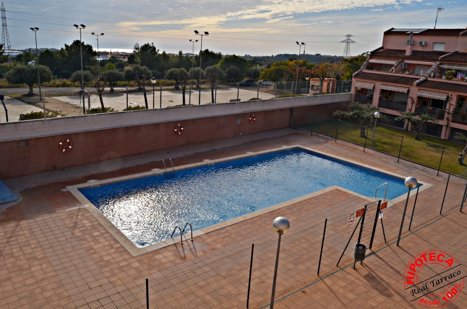 Swimming pool of Flat for sale in Roda de Berà  with Private garden, Terrace and Community pool