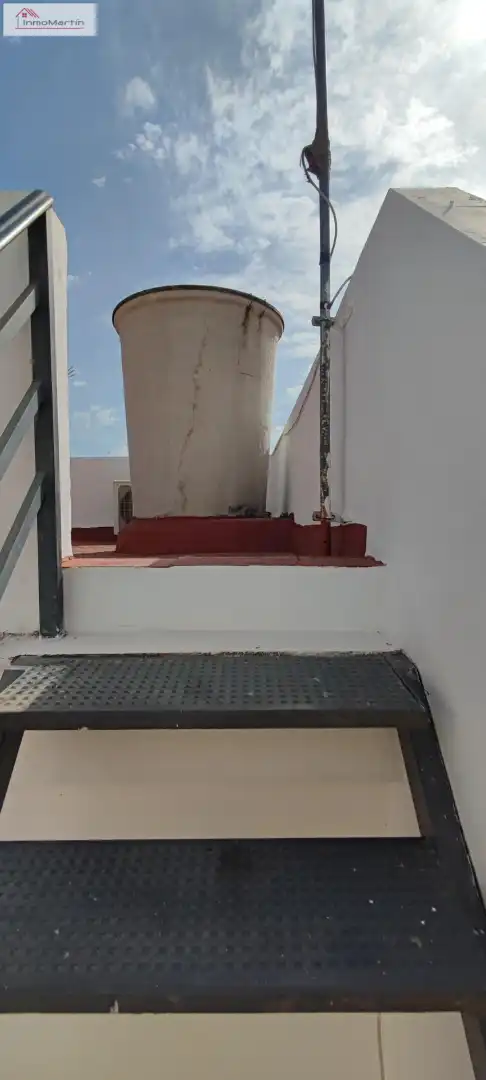 Vista exterior de Casa adosada en venta en Alcalá del Río con Aire acondicionado, Terraza y Trastero