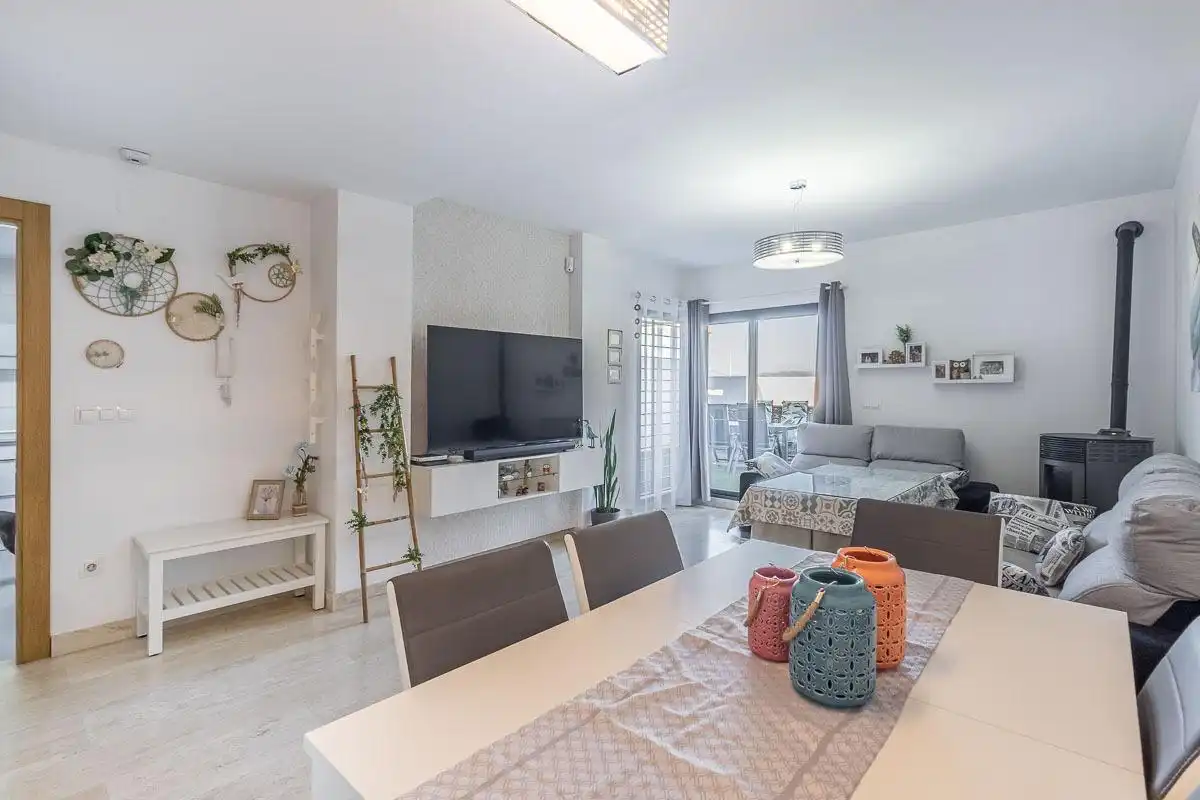Sala de estar de Casa adosada en venta en Las Gabias con Piscina comunitaria