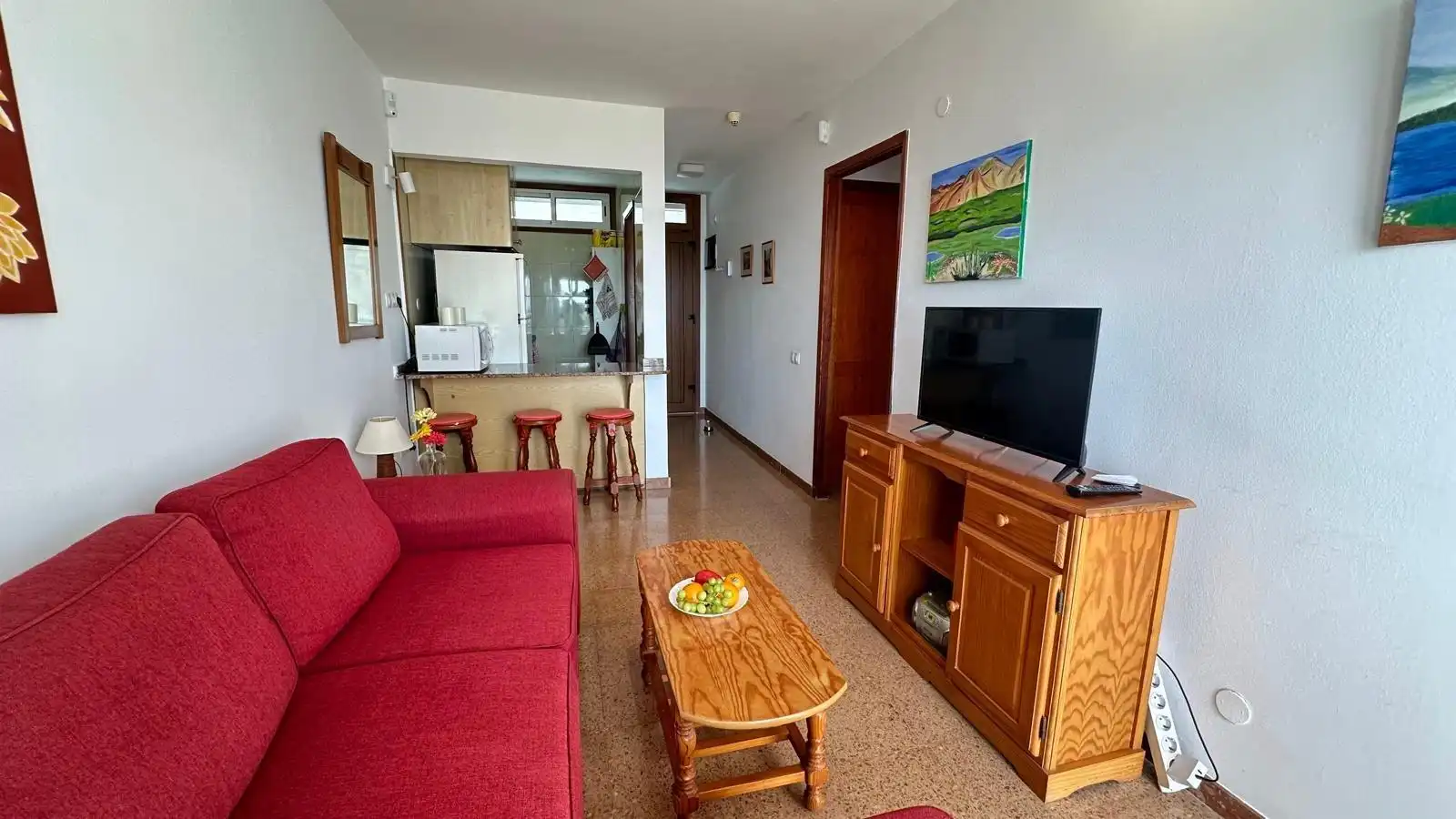 Sala de estar de Apartamento en venta en San Bartolomé de Tirajana con Amueblado, Balcón y Piscina comunitaria