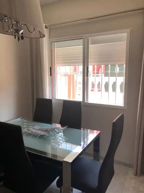 Comedor de Casa adosada en venta en Valencina de la Concepción con Aire acondicionado, Calefacción y Terraza