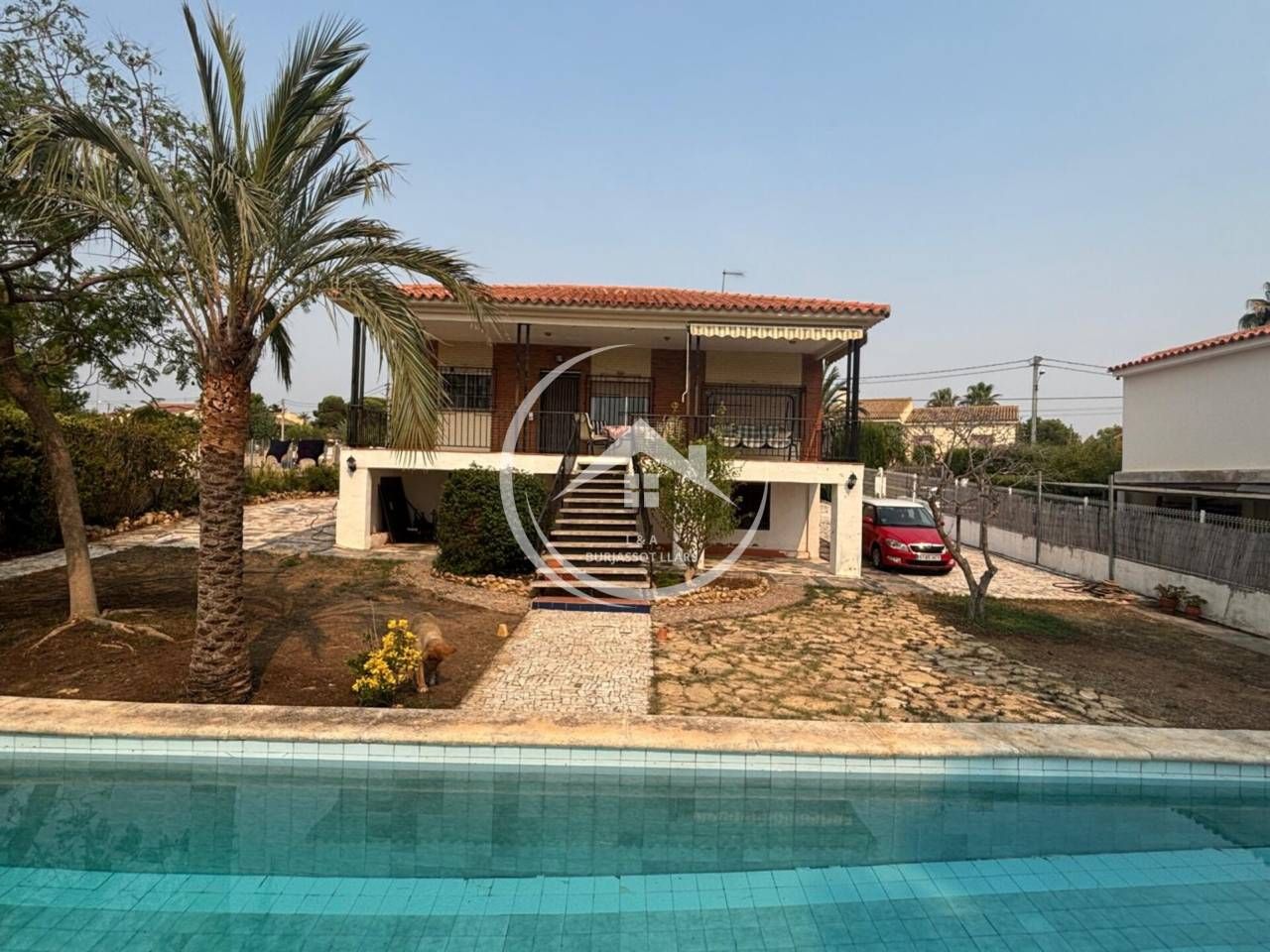 Vista exterior de Casa o xalet en venda en Torrent amb Jardí privat, Terrassa i Alarma