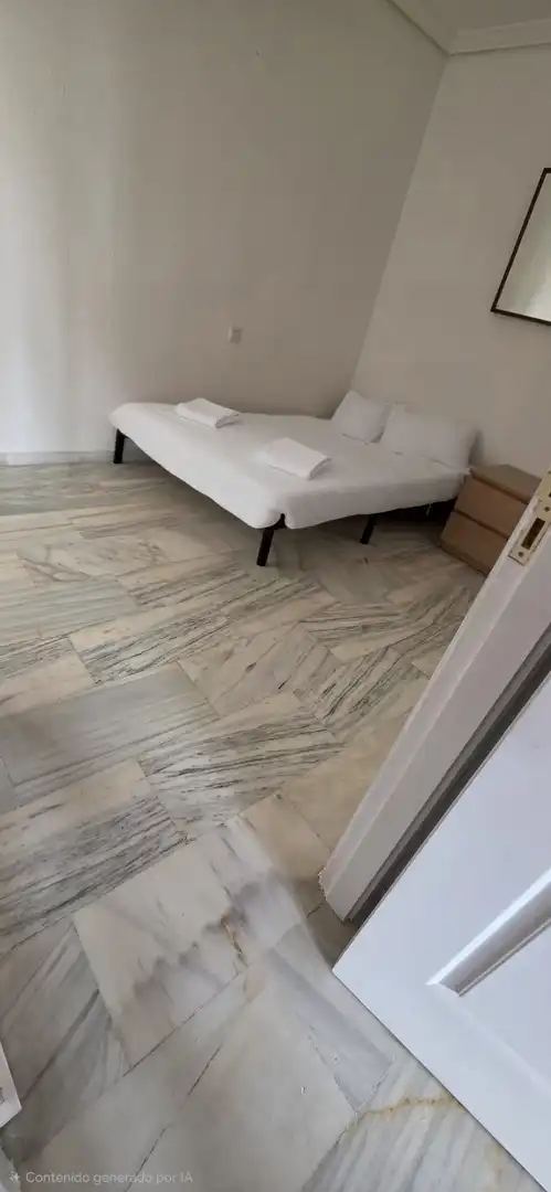 Dormitori de Apartament de lloguer en Benalmádena amb Terrassa i Piscina comunitària