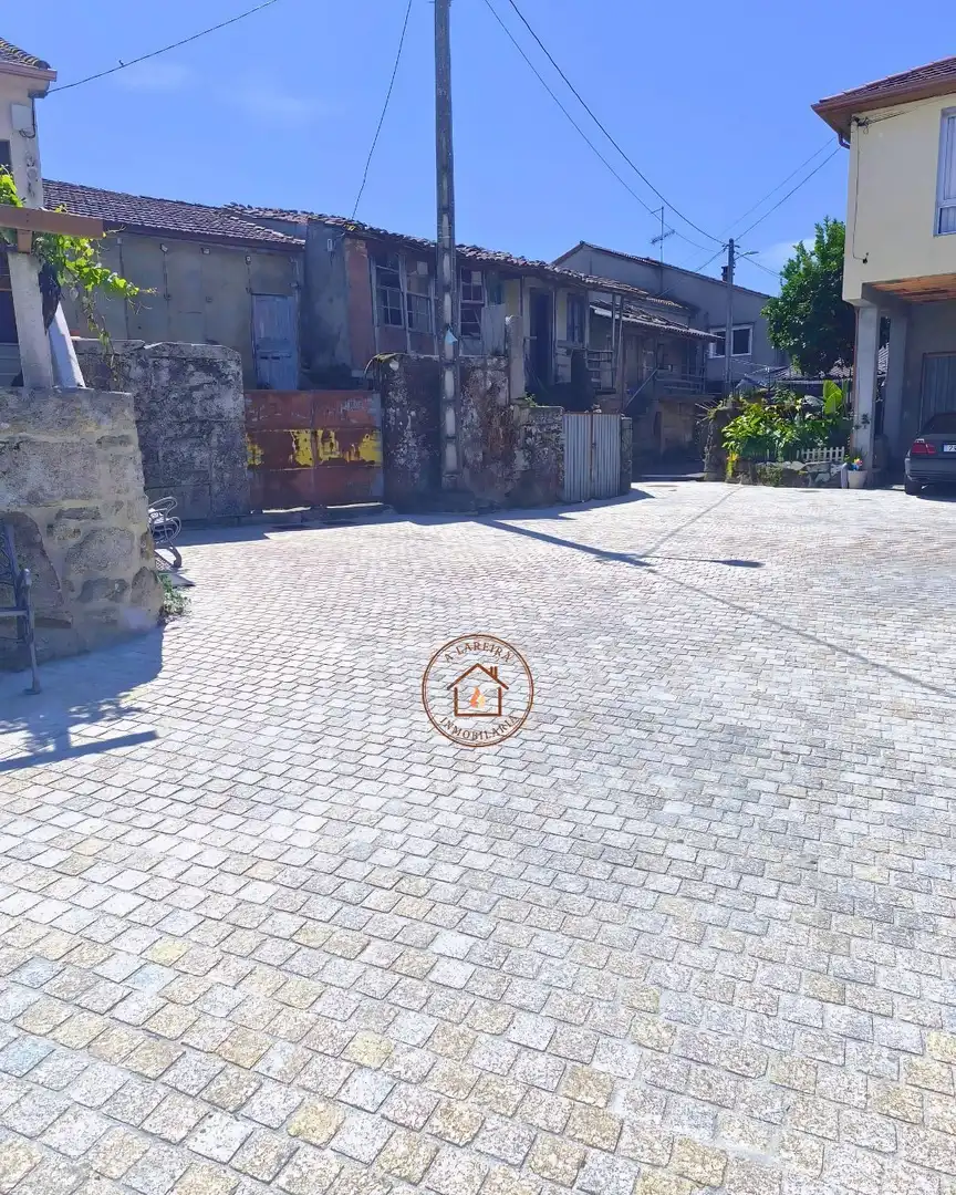 Casa rústica amb jardí en venda a Amoeiro