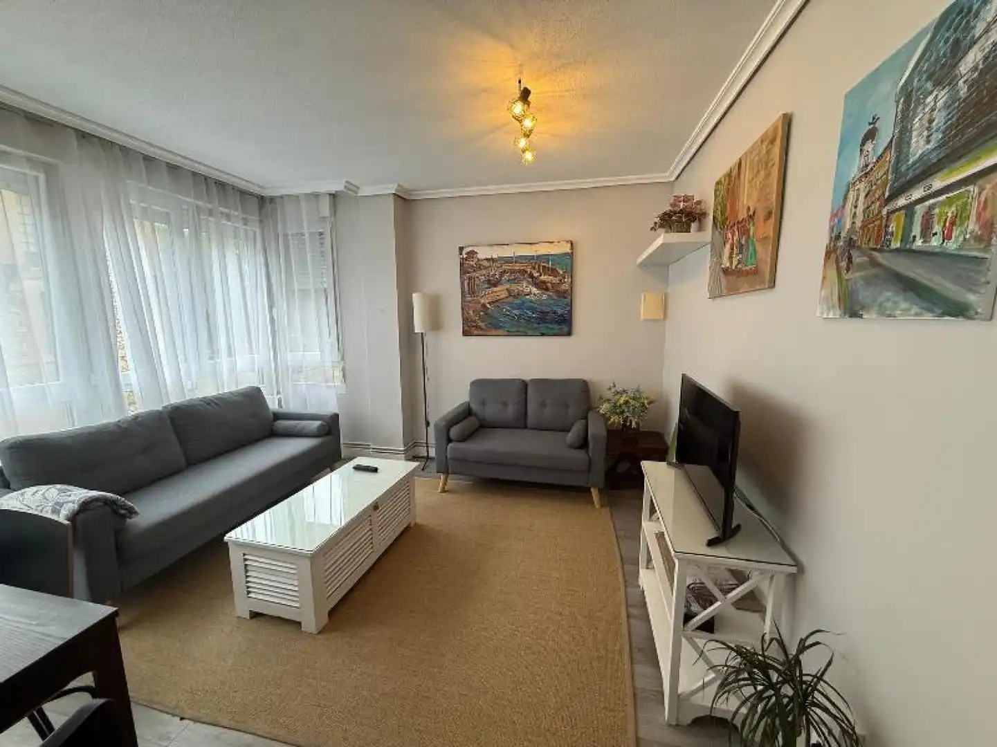 Wohnzimmer von Wohnung zur Miete in Comillas (Cantabria) mit Heizung, Parkett und Terrasse