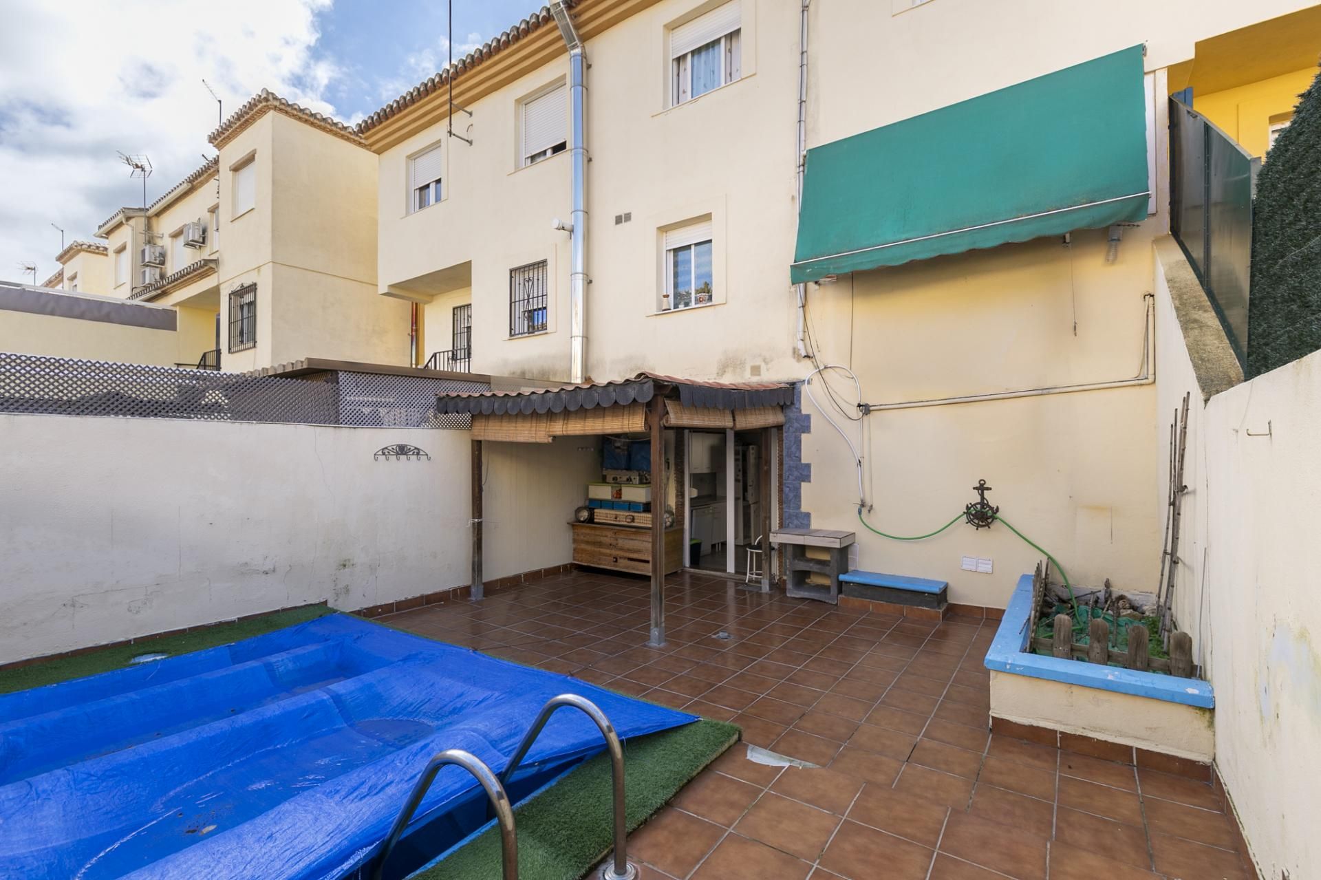 Jardín de Casa adosada en venta en Vegas del Genil con Terraza y Piscina comunitaria