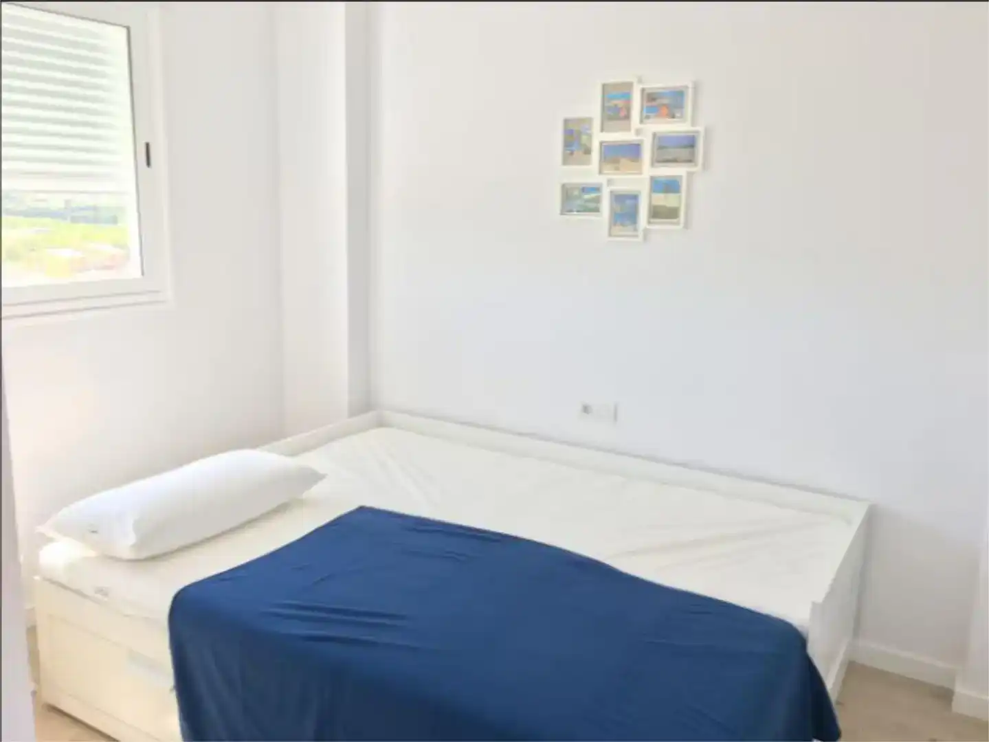 Dormitori de Pis de lloguer en Oliva amb Aire condicionat, Piscina i Moblat