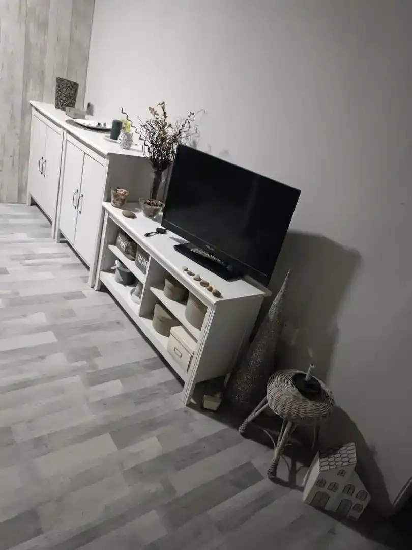 Sala d'estar de Casa adosada en venda en Escatrón amb Aire condicionat, Jardí privat i Moblat