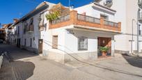 Vista exterior de Casa o xalet en venda en Guadix amb Calefacció, Terrassa i Balcó