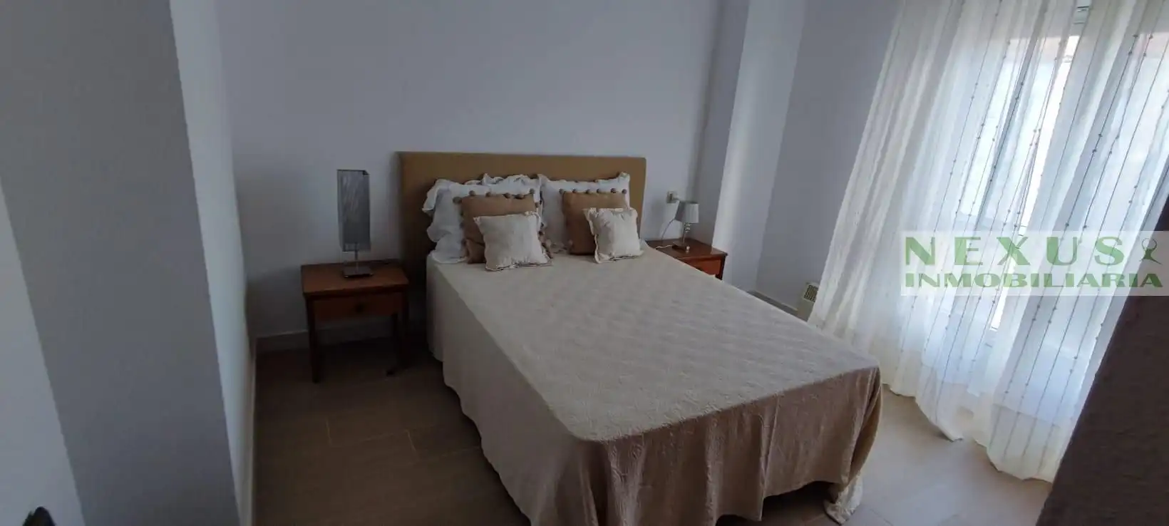 Schlafzimmer von Dachboden zur Miete in Cáceres mit Klimaanlage, Heizung und Möbliert