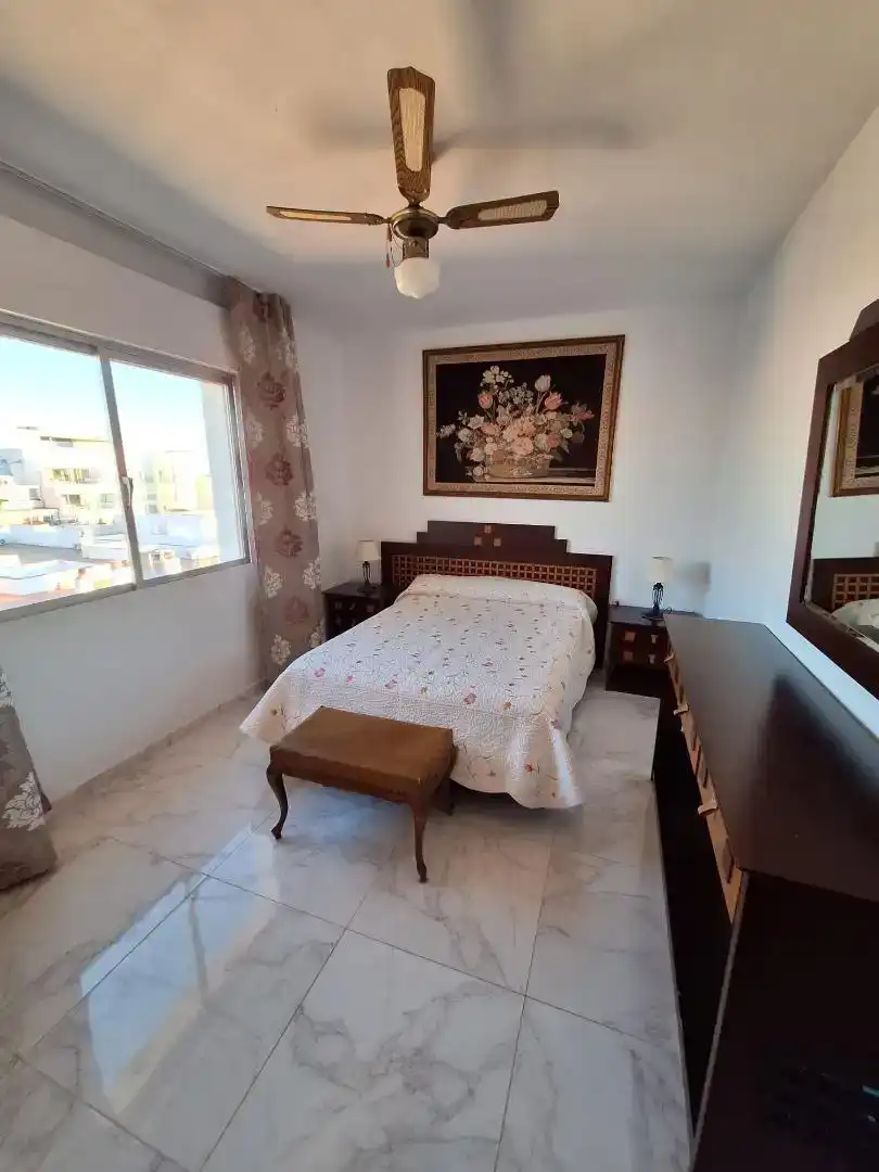 Dormitori de Apartament per a compartir en Estepona amb Moblat, Forn i Rentadora