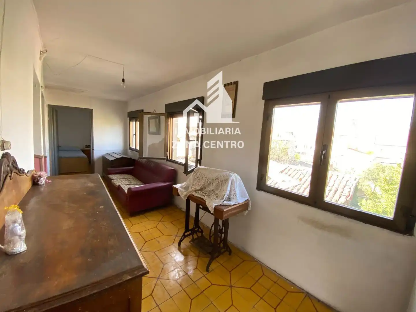 Sala de estar de Casa adosada en venta en Baltanás con Calefacción, Jardín privado y Amueblado