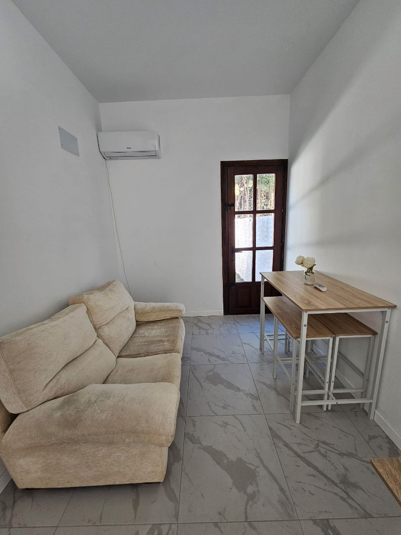 Living room of Apartment to rent in Coín  with Air Conditioner, Heating and Private garden