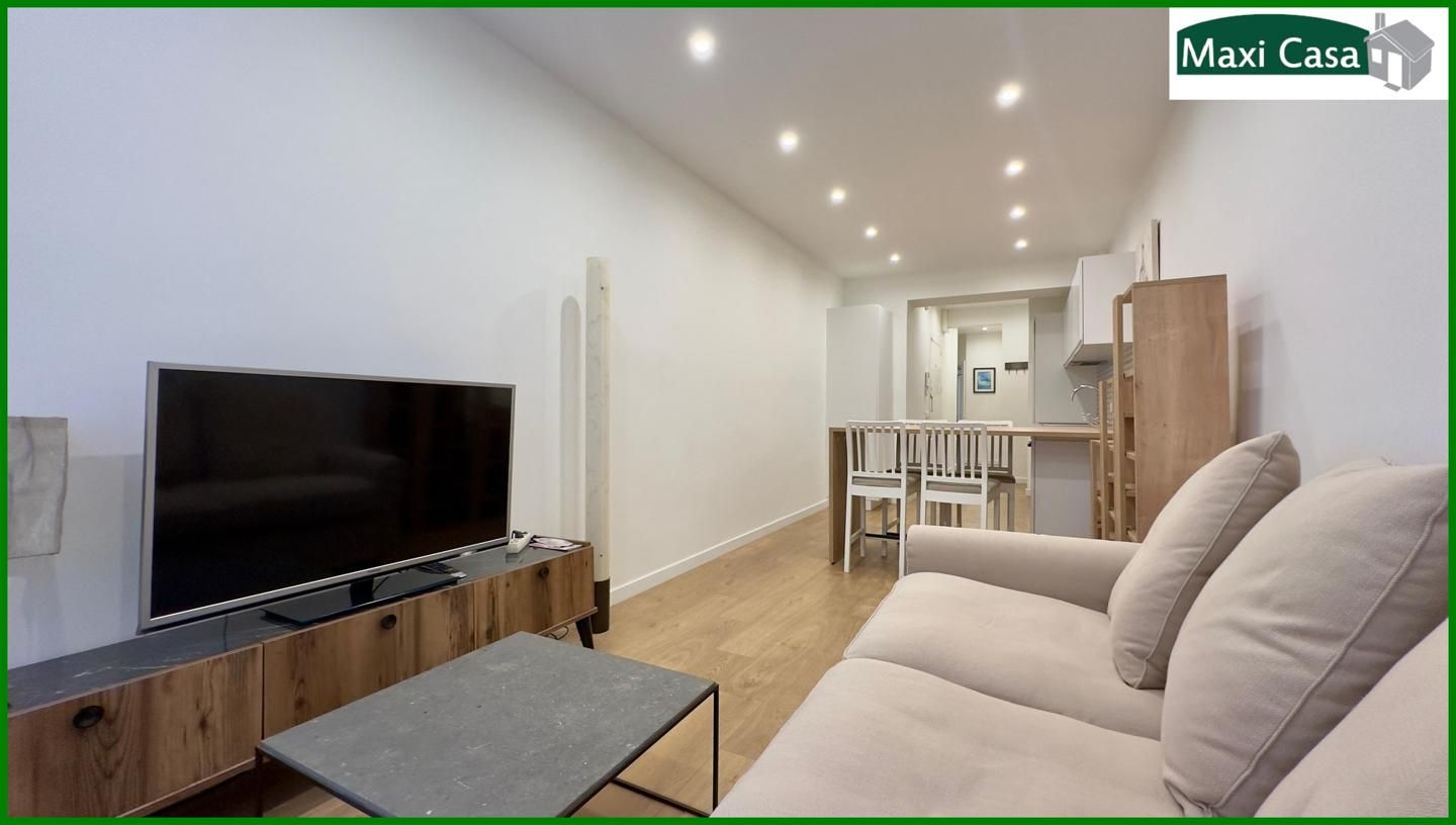 Living room of Planta baja for sale in  Barcelona Capital  with Air Conditioner and Heating