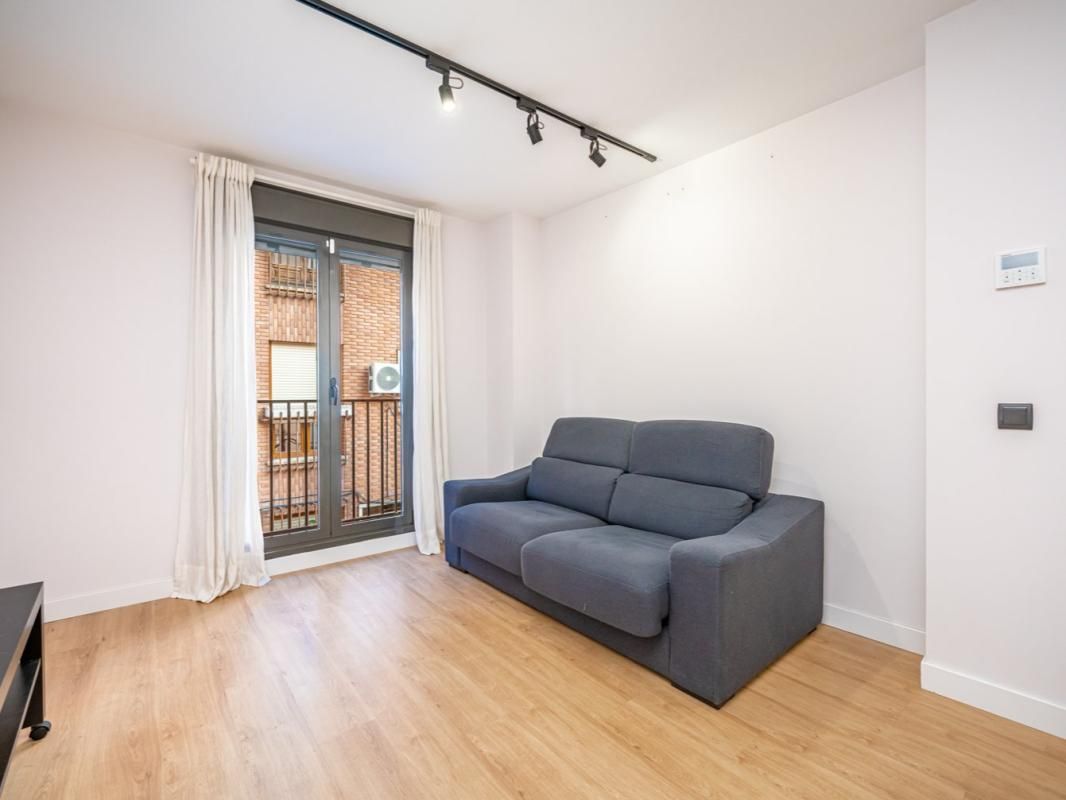 Living room of Flat for sale in  Madrid Capital  with Storage room and Swimming Pool