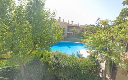 Swimming pool of Single-family semi-detached for sale in Marbella  with Air Conditioner, Parquet flooring and Terrace
