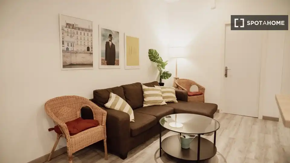 Sala de estar de Piso para compartir en Barcelona con Aire acondicionado, Calefacción y Amueblado