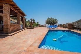 Swimming pool of Country house to rent in Torrox