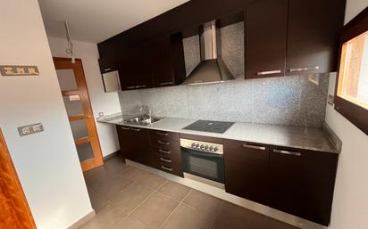 Kitchen of Duplex for sale in Cassà de la Selva  with Air Conditioner, Heating and Storage room