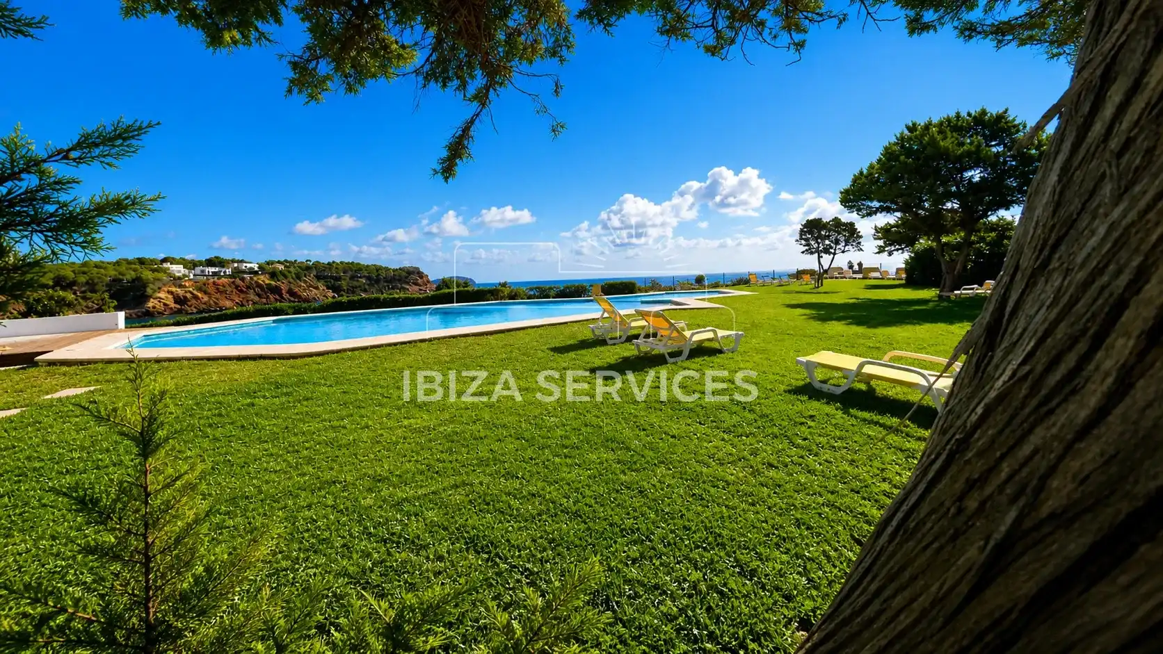 Jardín de Piso de alquiler en Santa Eulària des Riu con Aire acondicionado, Jardín privado y Piscina