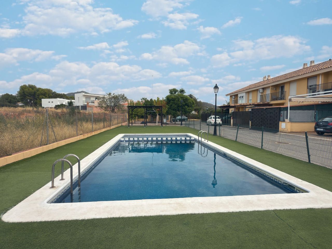 Piscina de Casa adosada en venda en Náquera amb Piscina comunitària