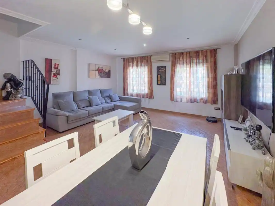 Sala d'estar de Casa adosada en venda en Sagunto / Sagunt amb Aire condicionat, Calefacció i Terrassa