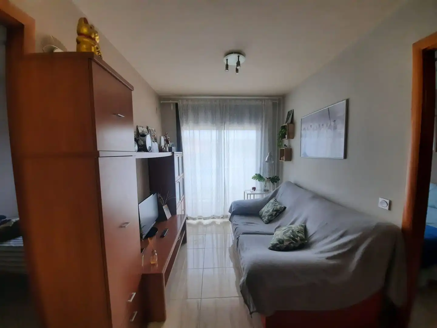 Wohnzimmer von Dachboden zum Verkauf in Reus mit Terrasse, Möbliert und Ofen