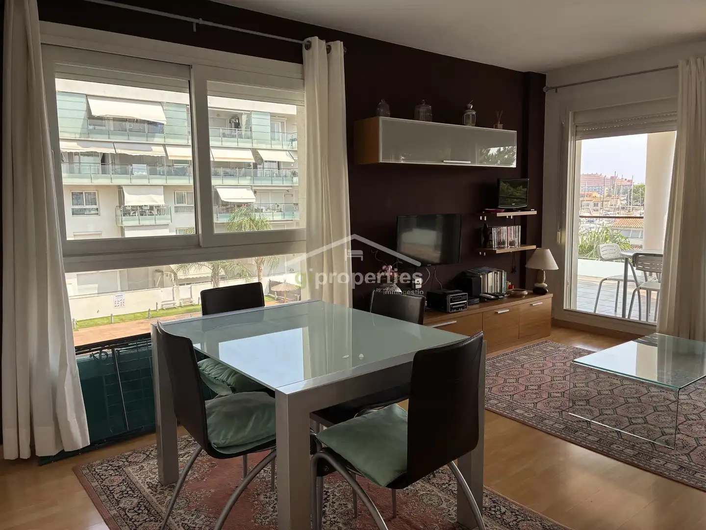 Living room of Apartments for sale in Roses  with Parquet flooring, Terrace and Furnished
