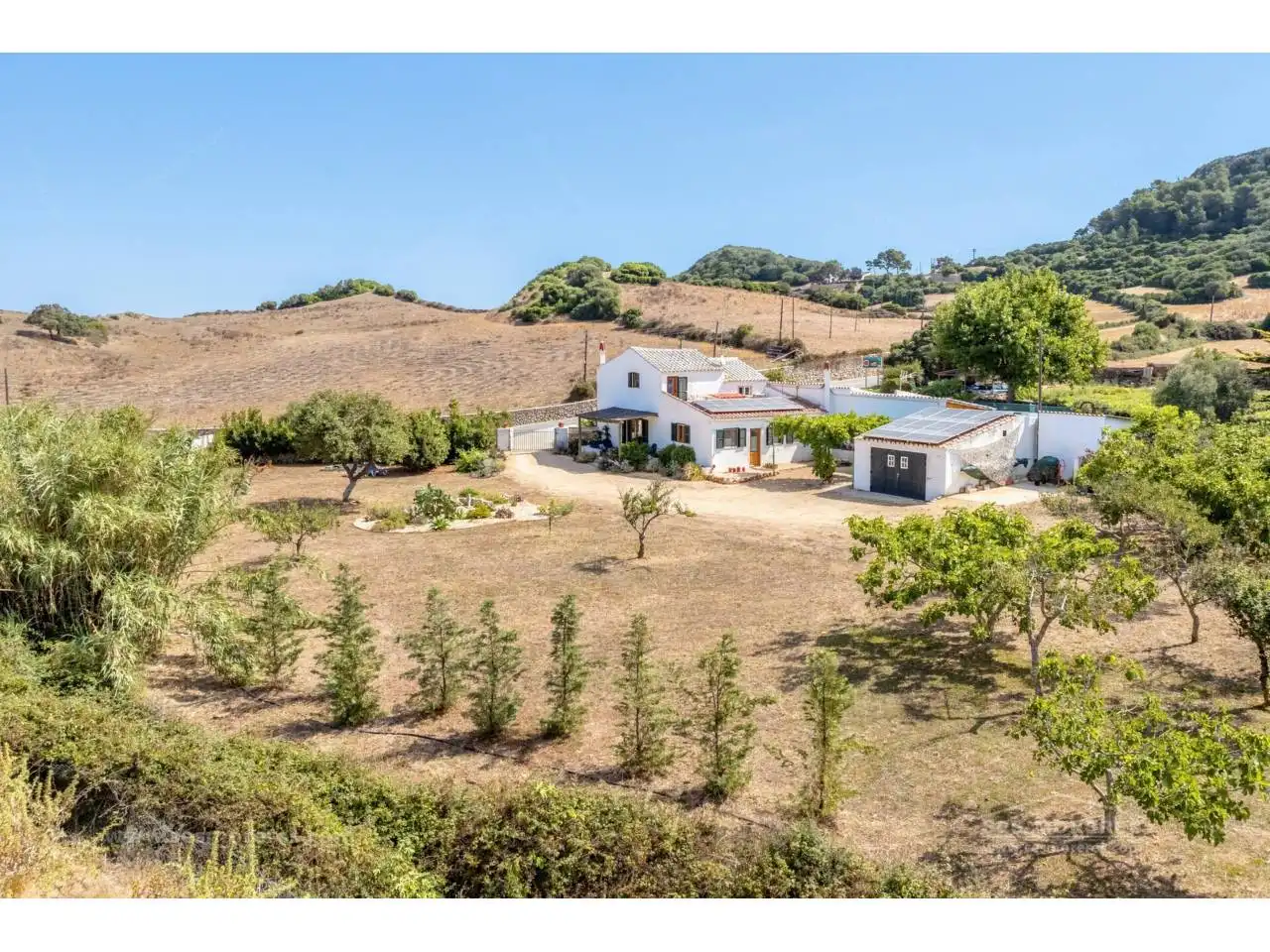 Vista exterior de Finca rústica en venda en Es Migjorn Gran amb Jardí privat i Terrassa