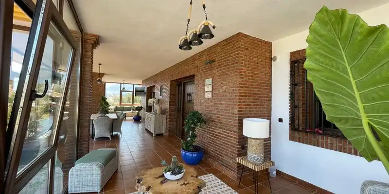 Sala d'estar de Casa o xalet en venda en Loja amb Aire condicionat, Jardí privat i Terrassa