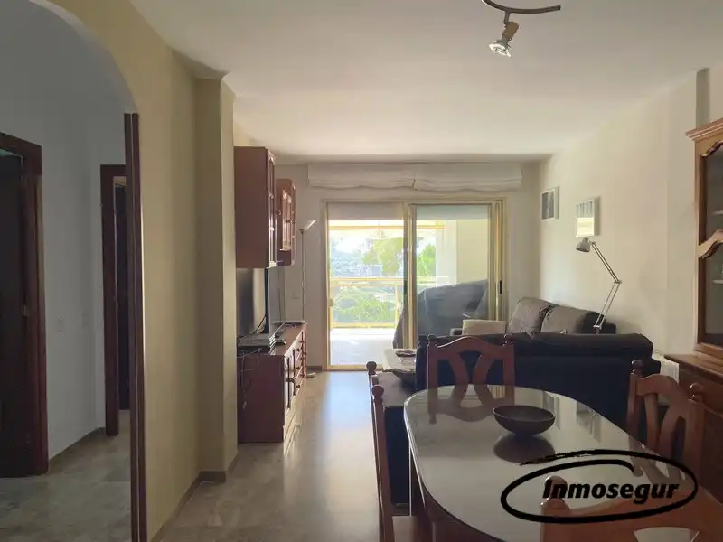 Sala de estar de Piso en venta en Salou con Terraza, Amueblado y Piscina comunitaria