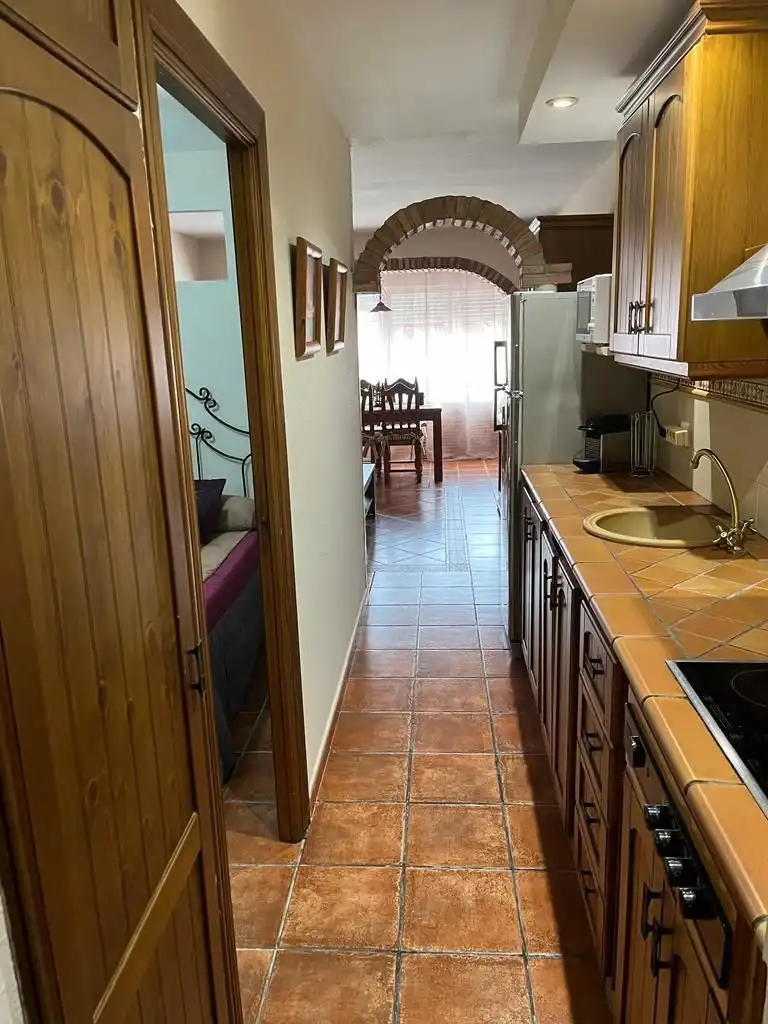 Cocina de Apartamento de alquiler en Algeciras con Aire acondicionado, Jardín privado y Amueblado