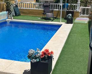 Swimming pool of Single-family semi-detached for sale in Benalmádena  with Air Conditioner, Heating and Terrace