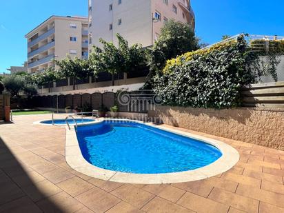 Swimming pool of Duplex for sale in Lloret de Mar  with Heating, Parquet flooring and Terrace
