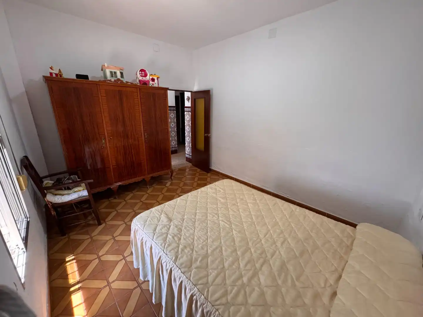 Dormitori de Casa adosada en venda en San Juan de Aznalfarache amb Traster