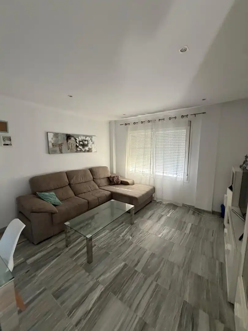 Sala de estar de Casa adosada en venta en Jerez de la Frontera con Aire acondicionado y Amueblado