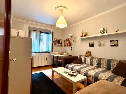 Living room of Flat for sale in Gijón   with Heating, Parquet flooring and Furnished