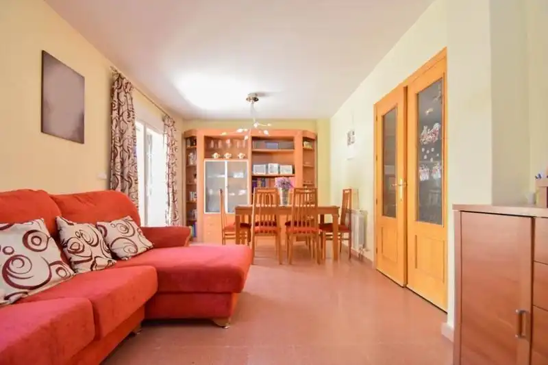 Sala d'estar de Casa o xalet en venda en Alhendín amb Jardí privat, Terrassa i Piscina comunitària