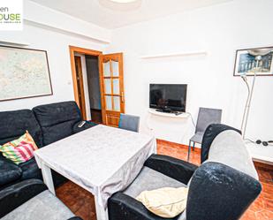 Living room of Flat for sale in  Granada Capital  with Air Conditioner, Furnished and Oven