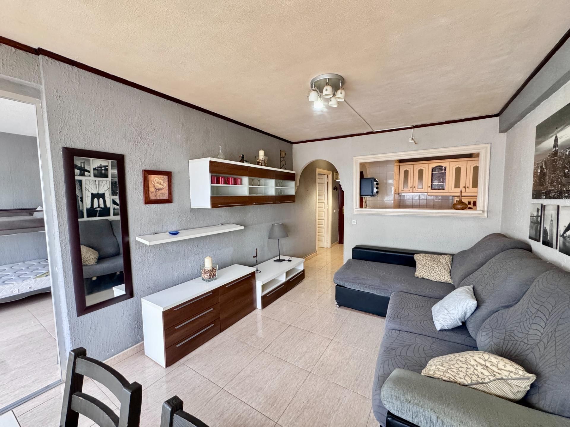 Living room of Flat for sale in Benalmádena  with Private garden, Terrace and Community pool