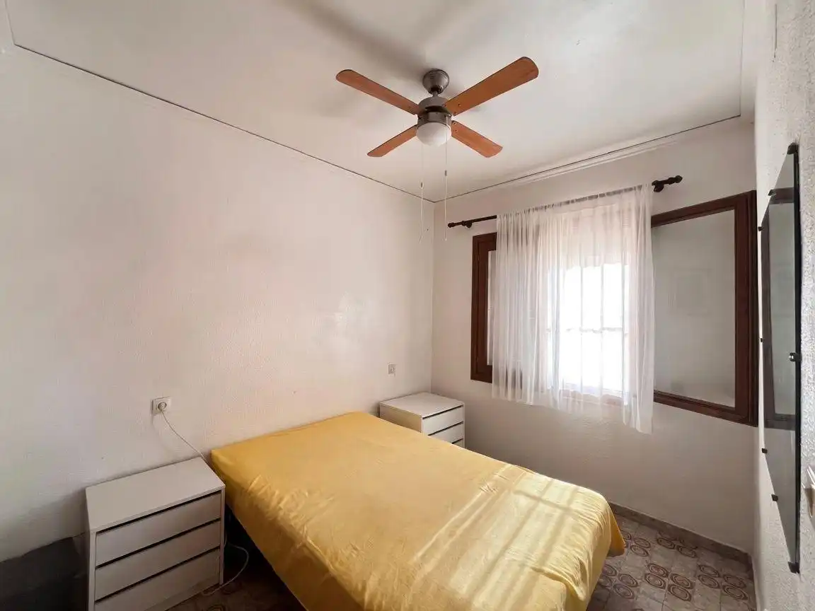 Dormitori de Casa adosada en venda en Dénia amb Jardí privat, Terrassa i Piscina comunitària