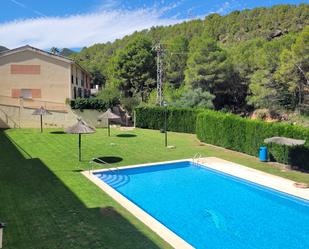 Piscina de Casa adosada de lloguer en Gilet amb Calefacció, Terrassa i Traster